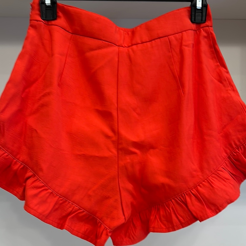 Identify Ditto small Women's Red Ruffle Hem Shorts. Like new